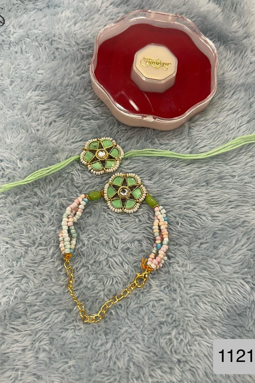 Bhai Rakhi with Teal Flowers and Golden Chain, with Matching Bhabhi White Bead Bracelet