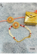 Rakhi Set with Crystal Flower Design, Peach and Gold Bracelet