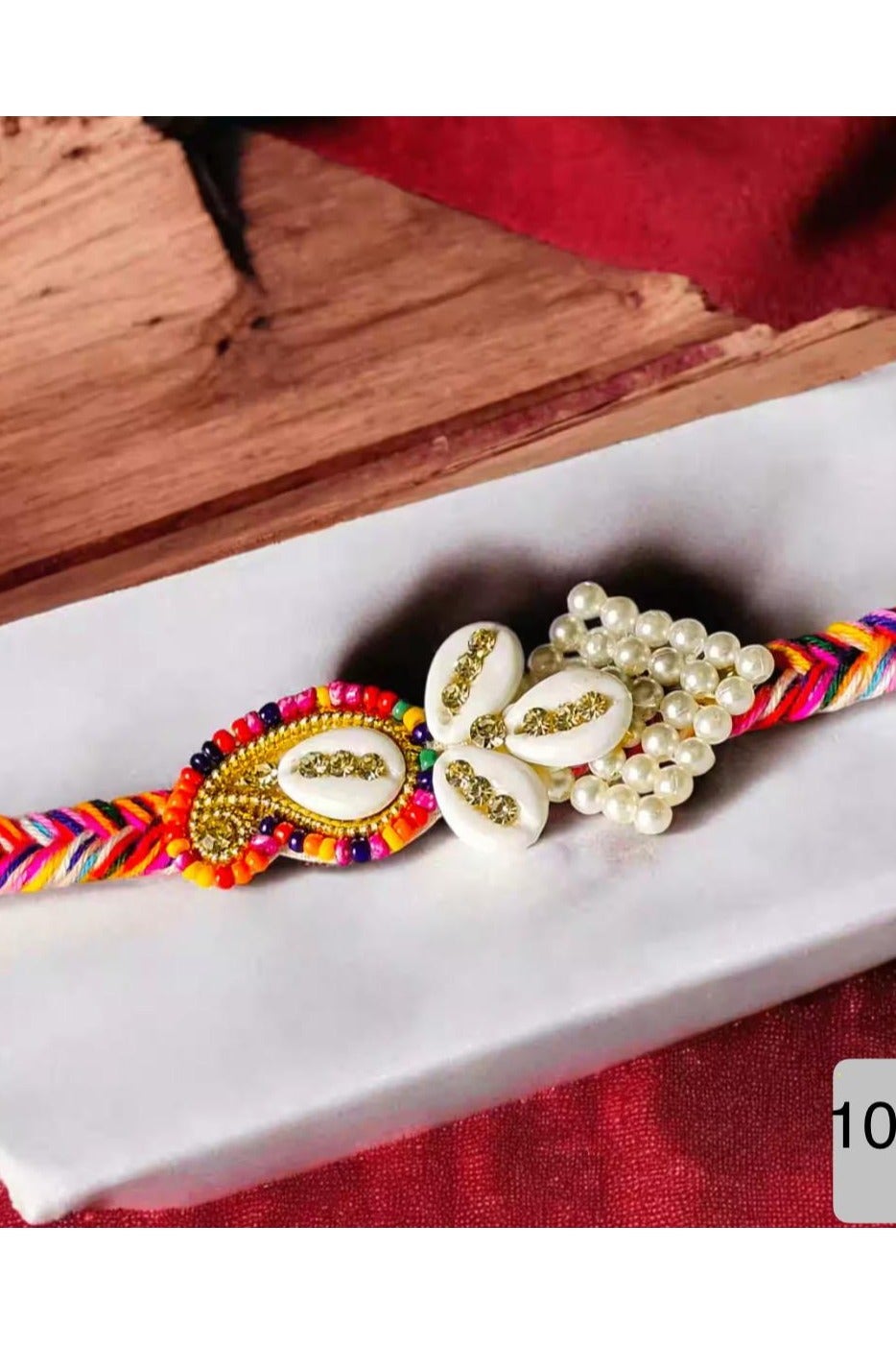 Multicolour Bhai Rakhi with Pearl and Shell Centre Piece, Pack of 1, Size 36