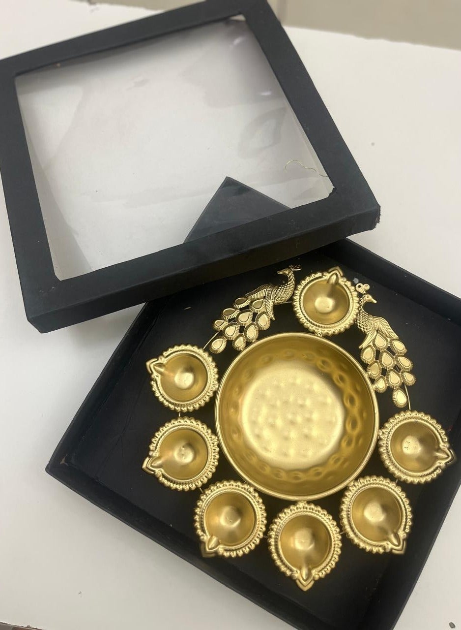 Gold Urli Bowl with 7 Diya Holders and Peacock Motif, 10 Inches, in Display Box, Diwali Decor