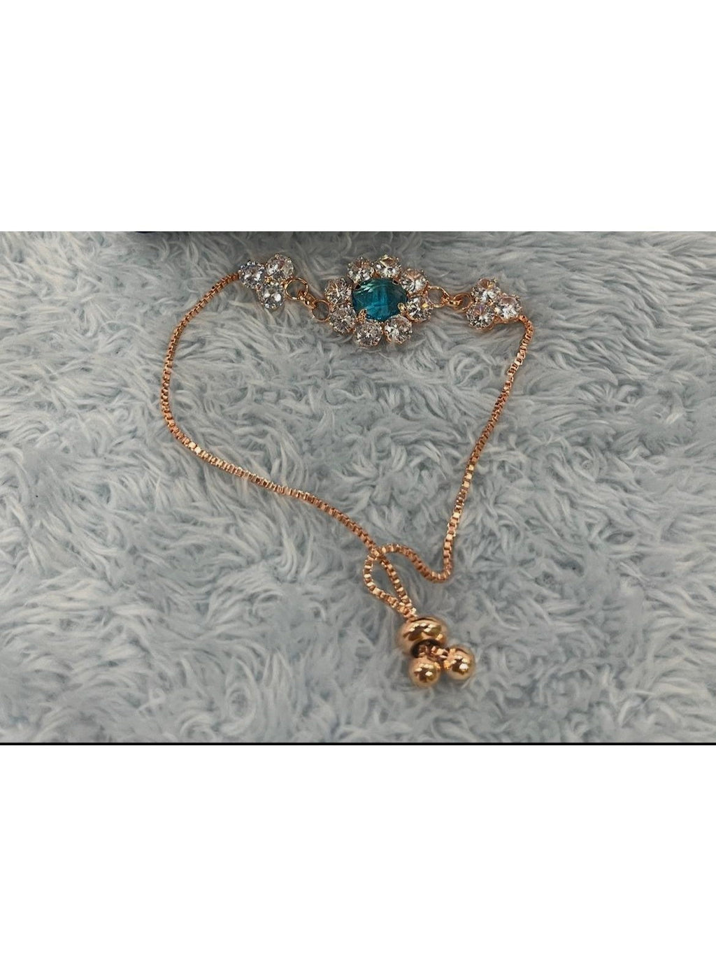 AD Crystal Adjustable Rakhi Bracelet with Blue Stone, Rose Gold Finish, for Sister or Bhabhi, Size 36